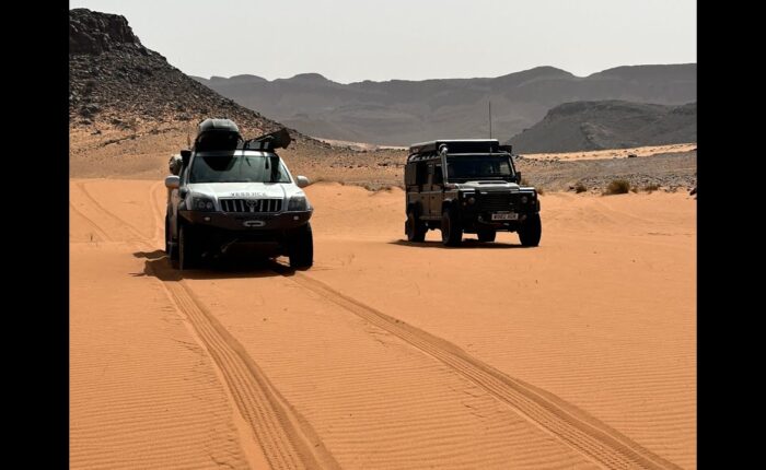 Off-road 4x4 driving in Merzouga desert sand, Erg Chebbi dunes adventure